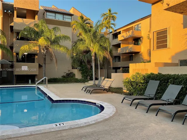 a work room with furniture and a window