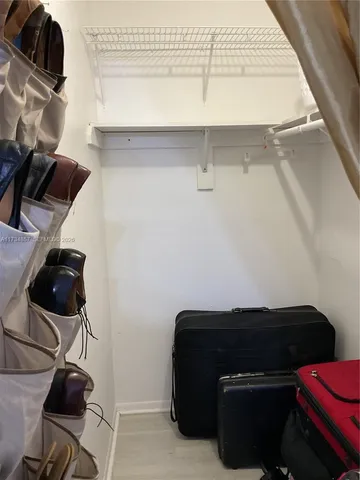 a front view of a house with garden and porch