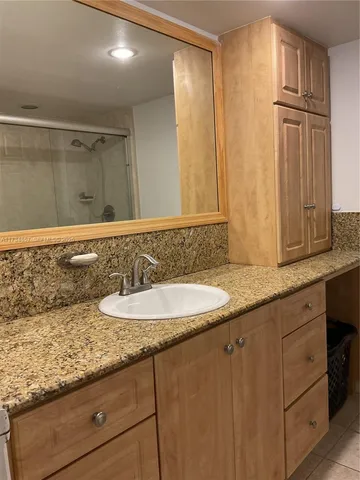 a view of a street with cars