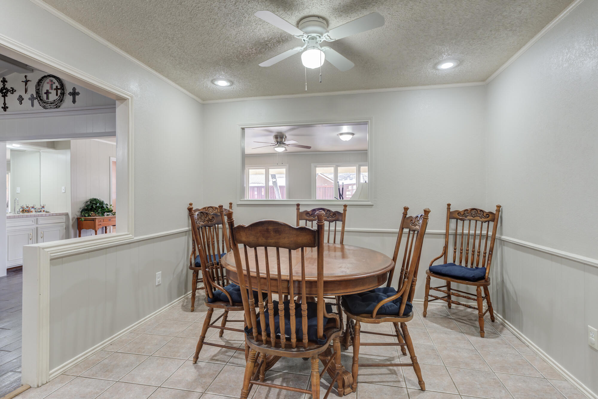 4809 78th Street Lubbock, TX 79424 - Photo 17 of 48 a view of a dining room with furniture and window