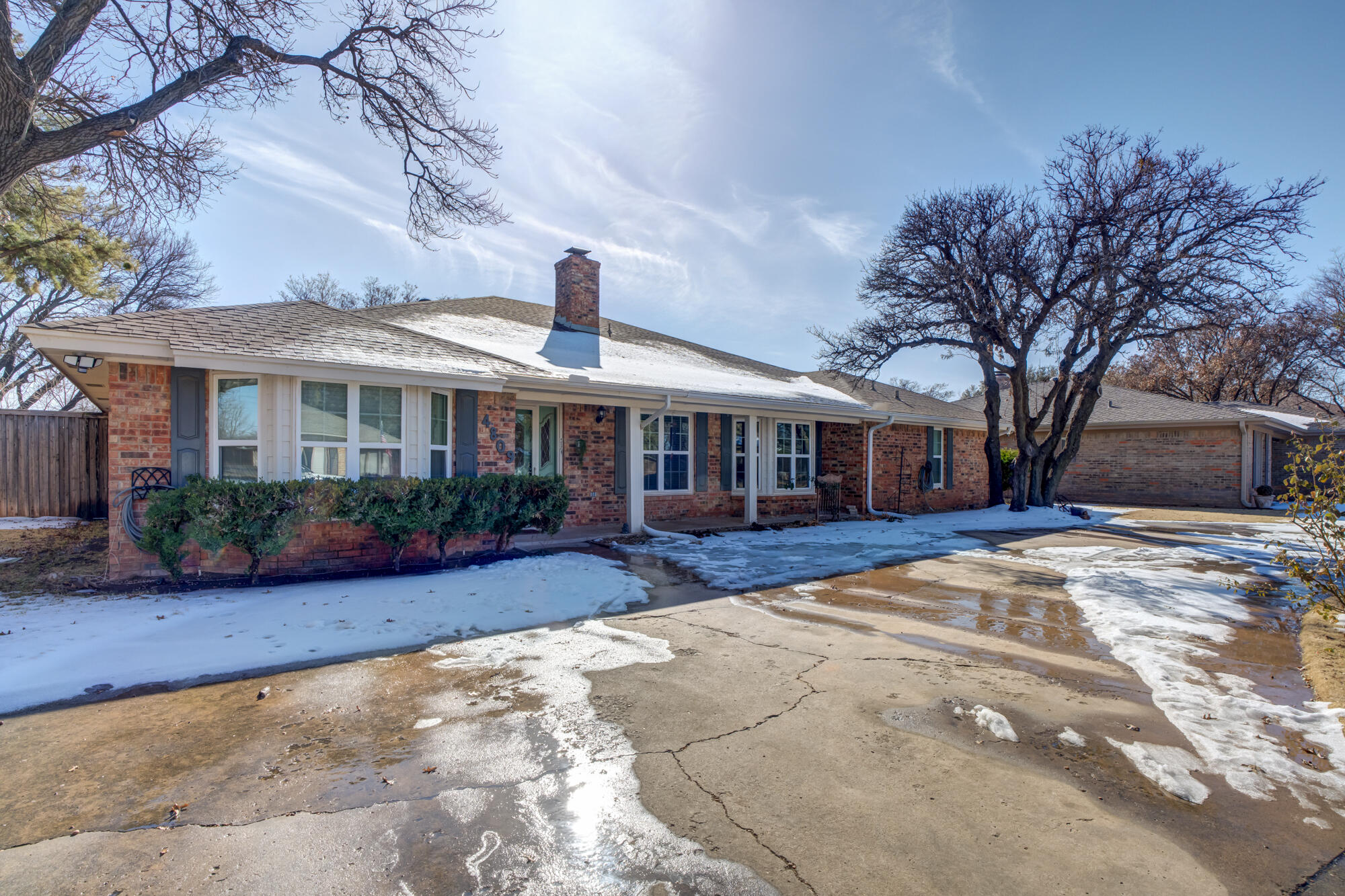 4809 78th Street Lubbock, TX 79424 - Photo 2 of 48 a front view of house with yard and green space