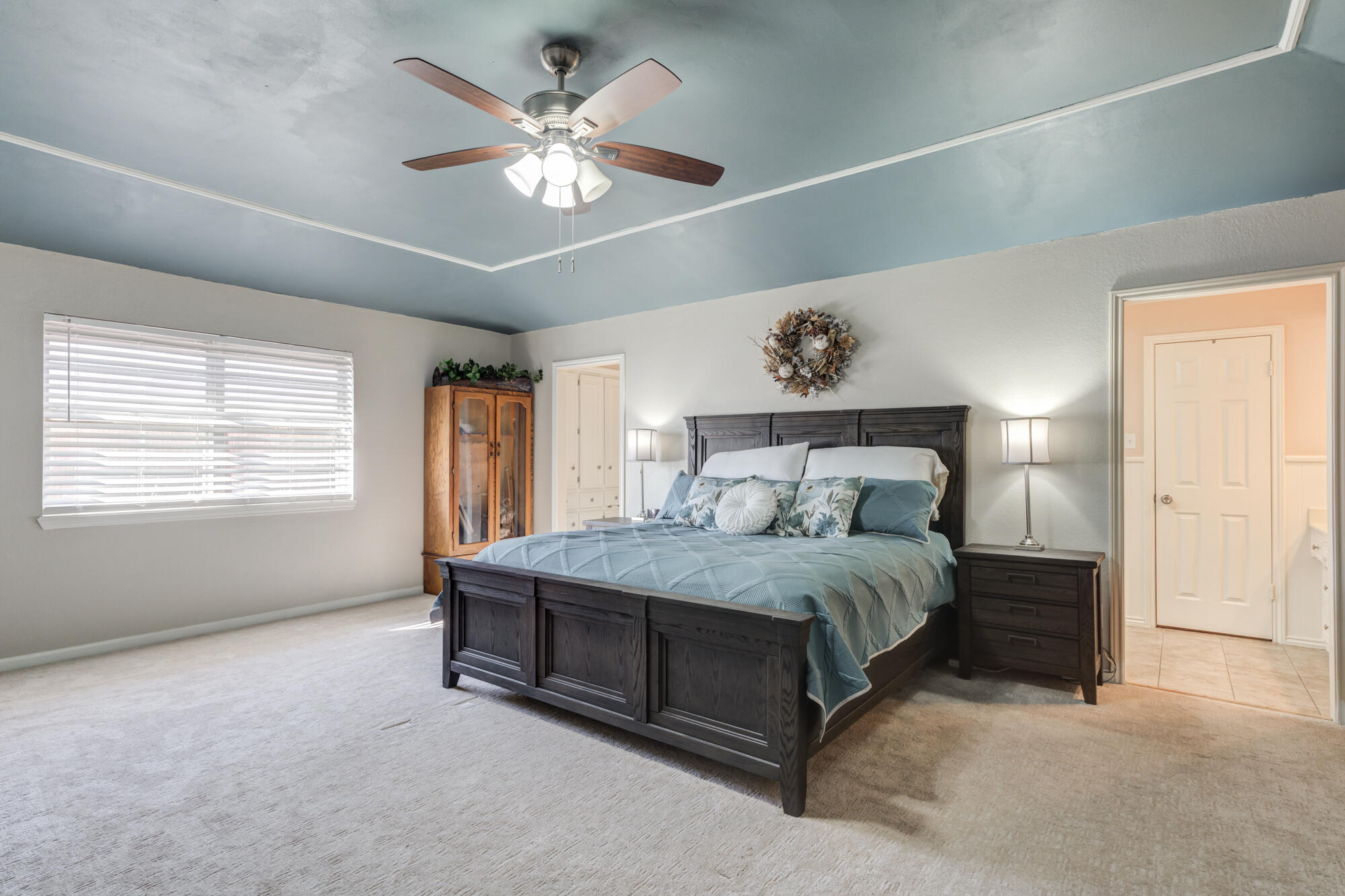 4809 78th Street Lubbock, TX 79424 - Photo 25 of 48 a spacious bedroom with a bed and window