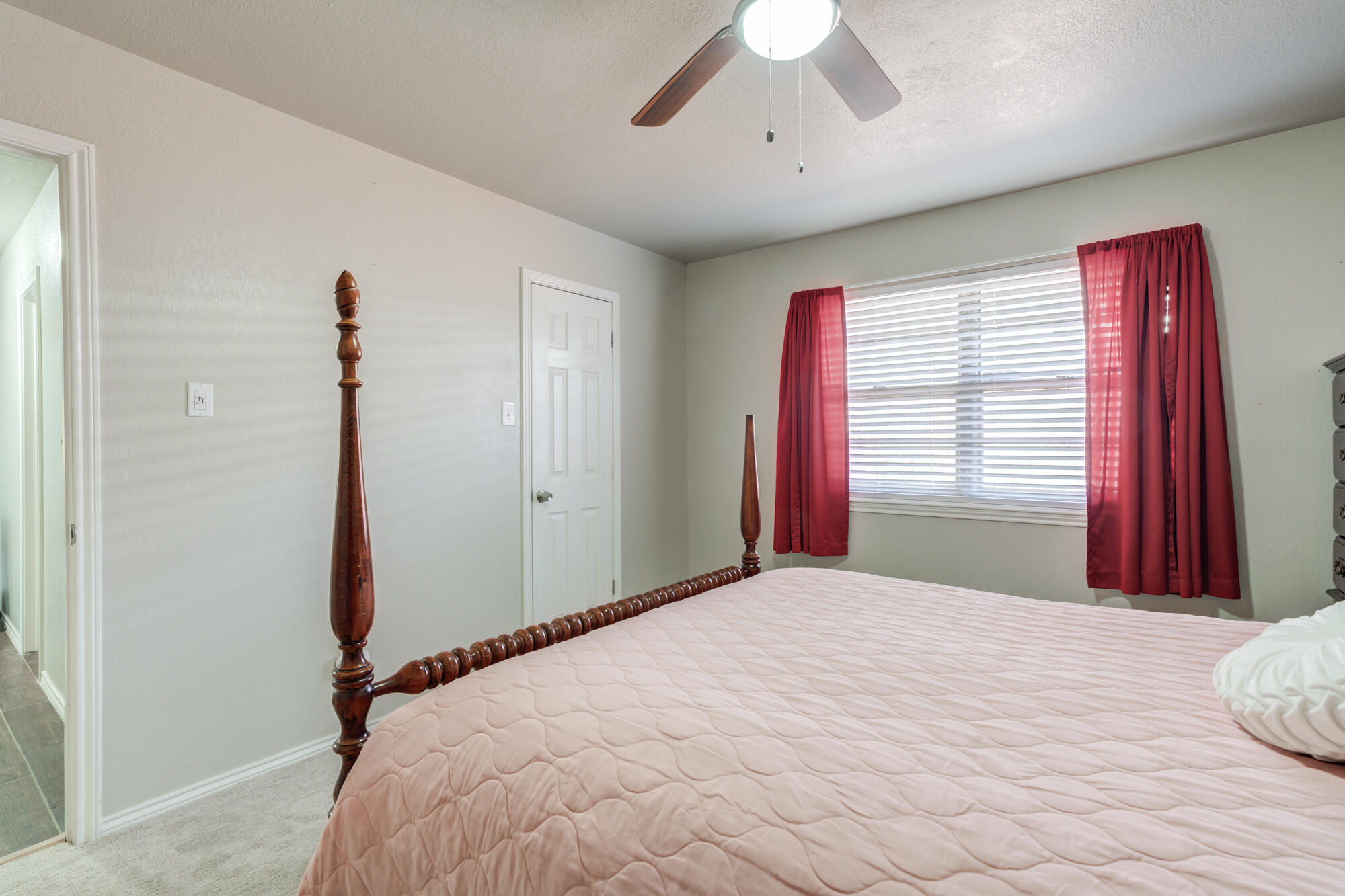 4809 78th Street Lubbock, TX 79424 - Photo 39 of 48 a bedroom with a bed and a window
