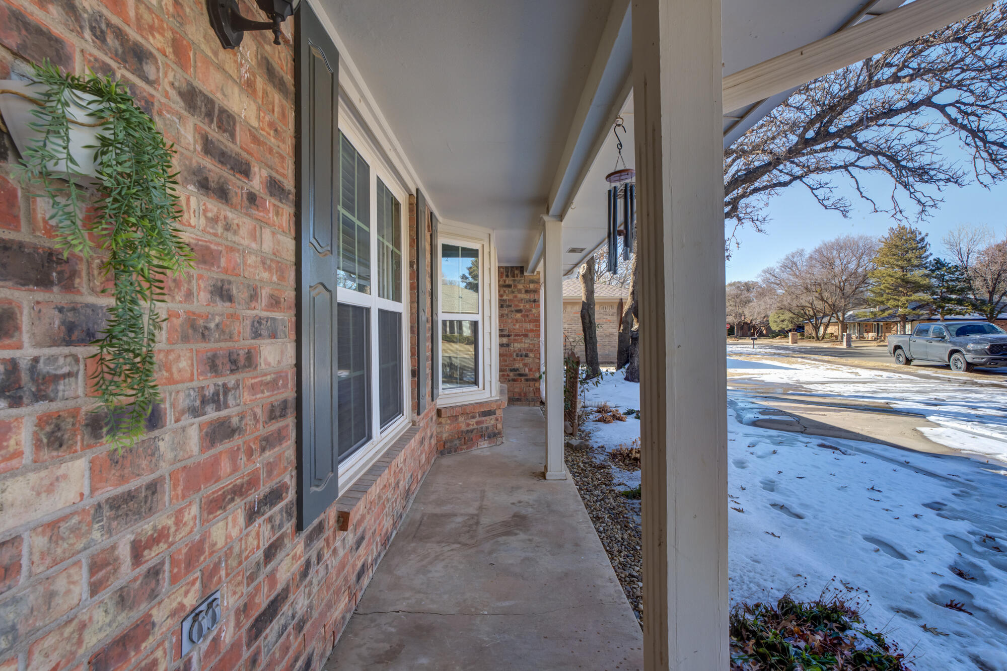 4809 78th Street Lubbock, TX 79424 - Photo 4 of 48 a view of a pathway of a building