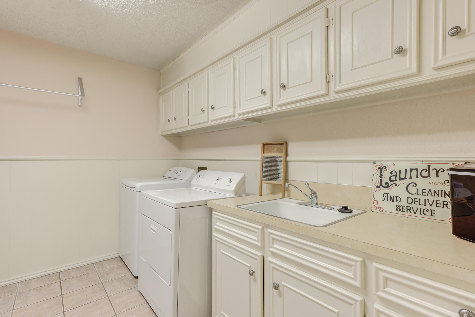 4809 78th Street Lubbock, TX 79424 - Photo 45 of 48 a utility room with dryer and washer