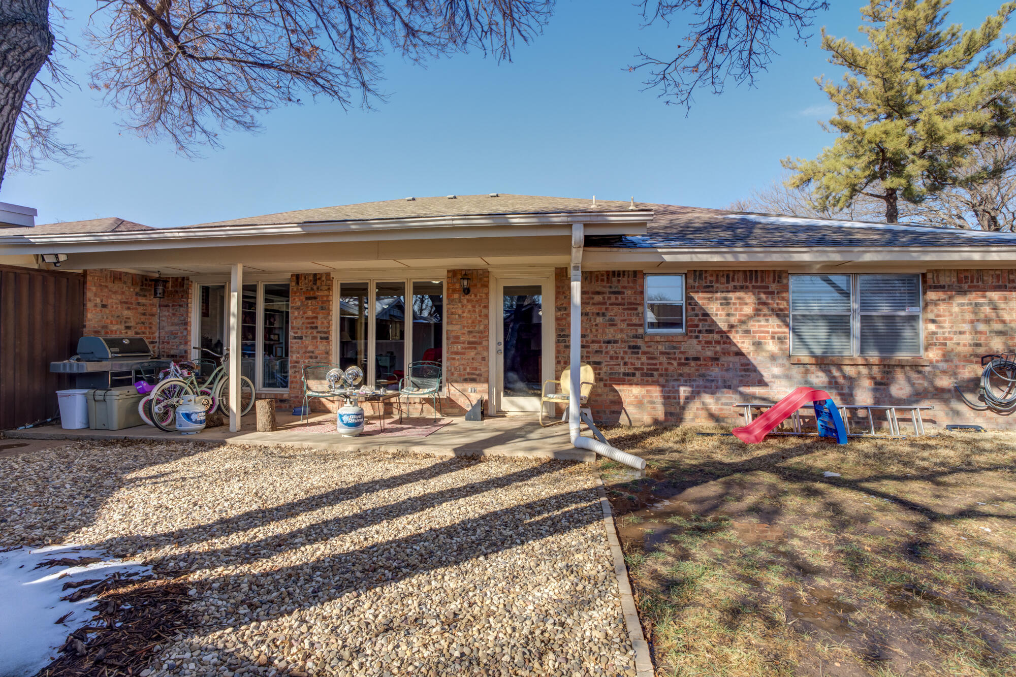 4809 78th Street Lubbock, TX 79424 - Photo 47 of 48 a view of a house with patio