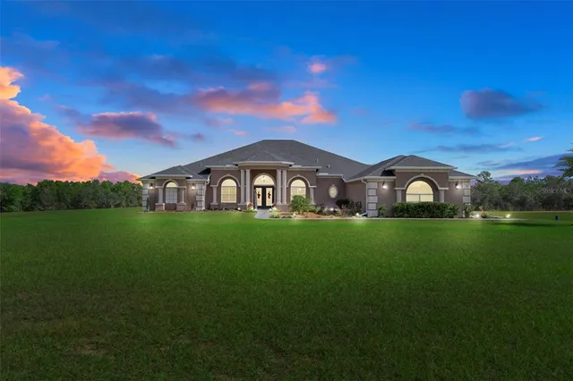 a view of a swimming pool with an ocean view