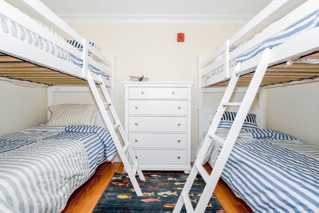 324 Front Street, Unit 2 Marion, MA 02738 - Photo 26 of 35 a bedroom with a bed and a window