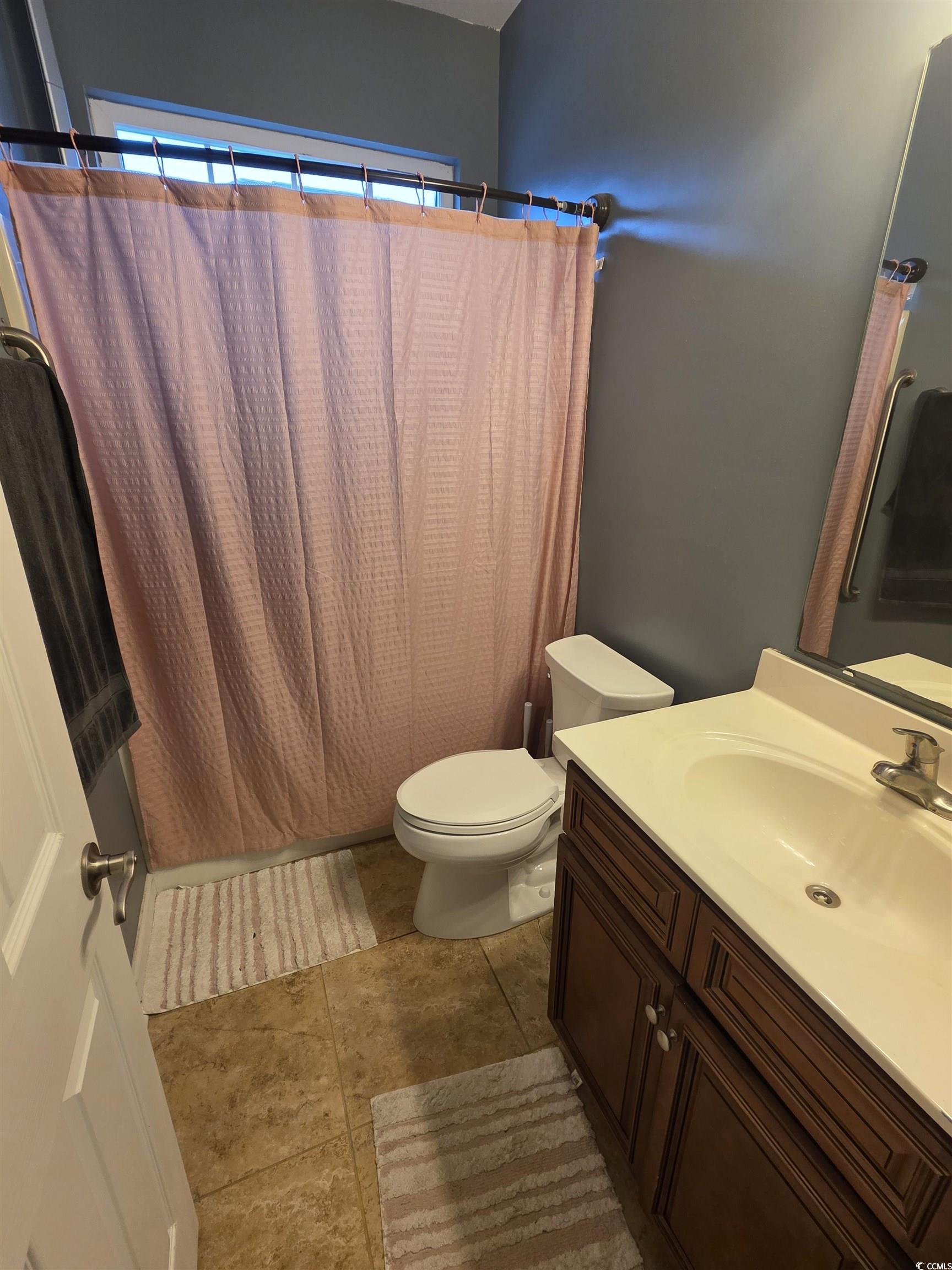 417 Cassian Way Myrtle Beach, SC 29588 - Photo 13 of 13 Full bath with vanity and shower / bath combination with curtain