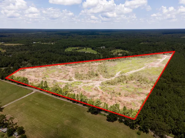 a view of swimming pool with a yard