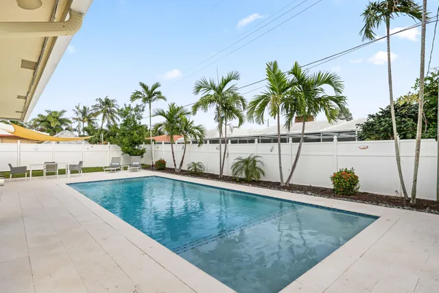 a view of outdoor space with swimming pool