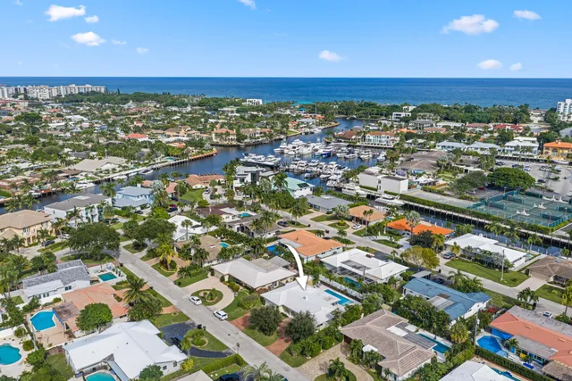 an aerial view of residential houses with outdoor space