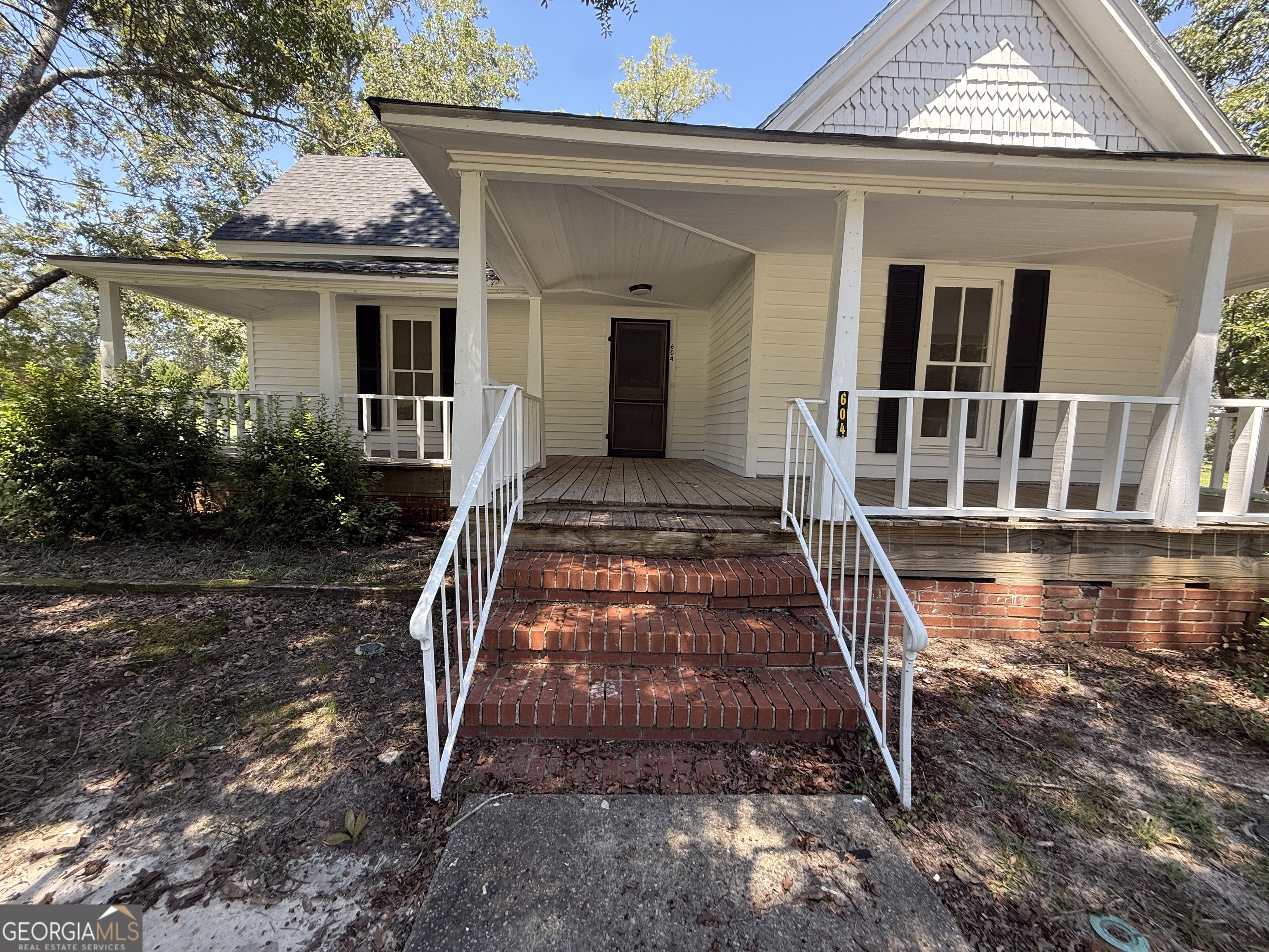 604 Shy Street Dexter, GA 31019 - Photo 14 of 36 front view of a house with a yard