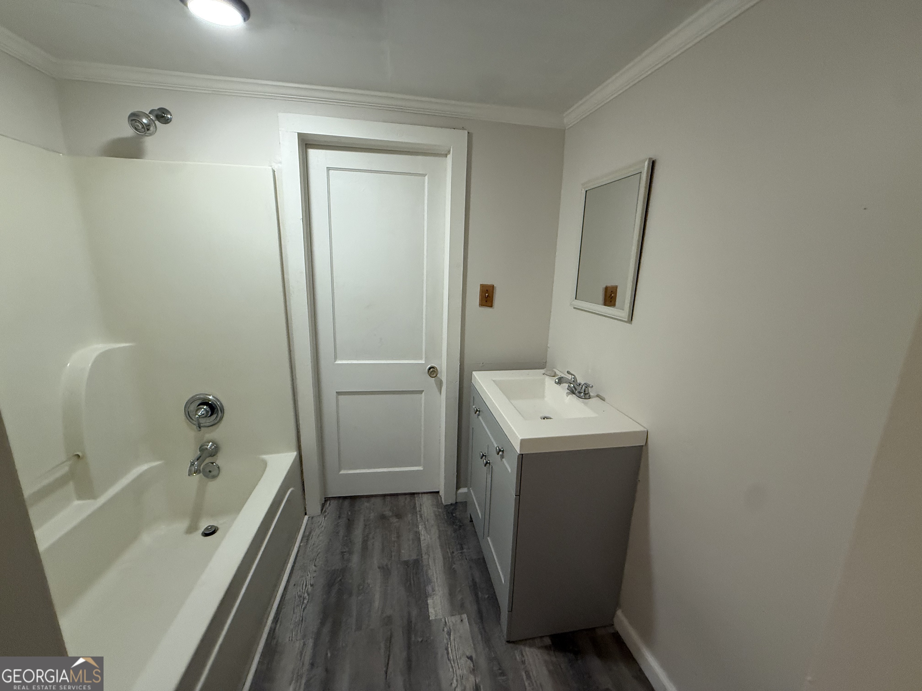 604 Shy Street Dexter, GA 31019 - Photo 22 of 36 a bathroom with a sink a toilet and shower