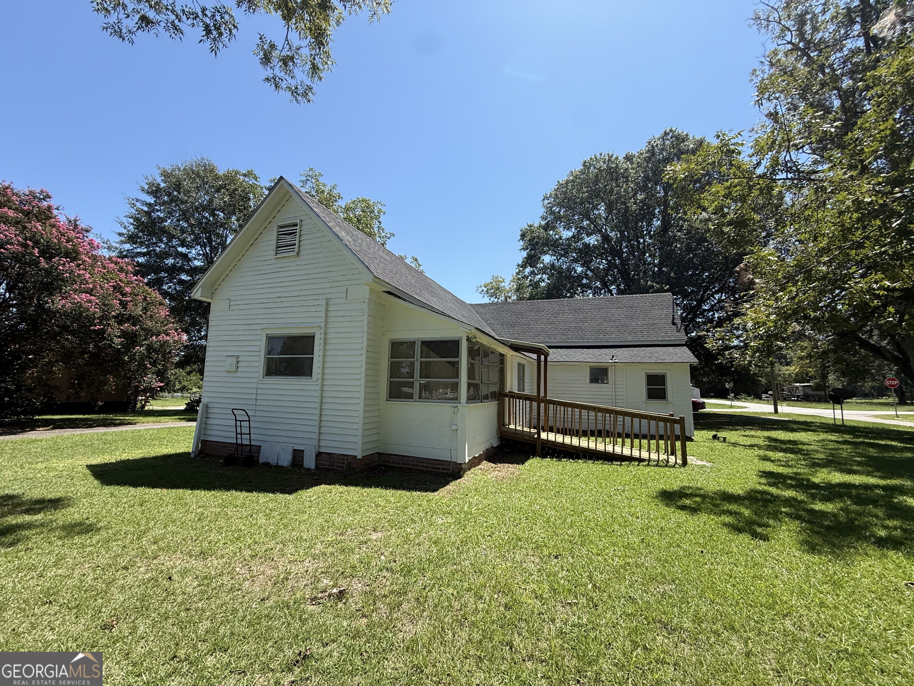 604 Shy Street Dexter, GA 31019 - Photo 8 of 36 a front view of a house with a yard