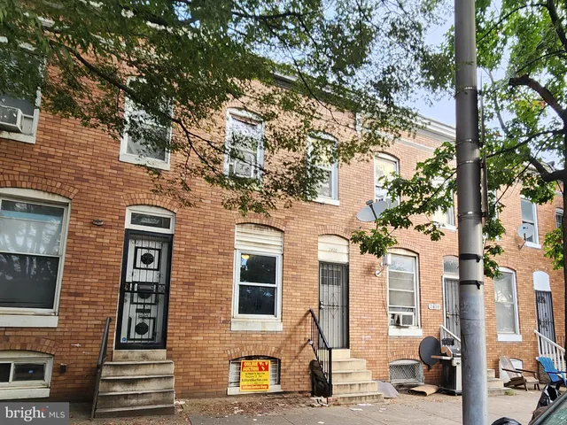 a front view of a multi story residential apartment building