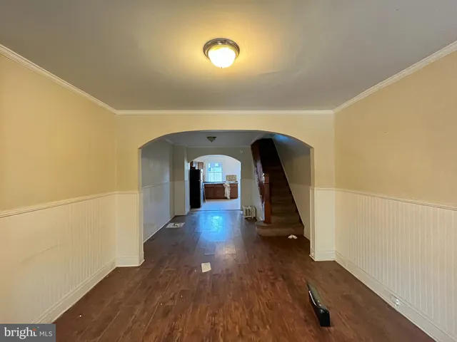 a view of gallery with wooden floor