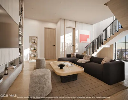 a living room with furniture and a table