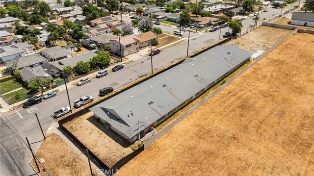 a view of a house with a snow in the yard