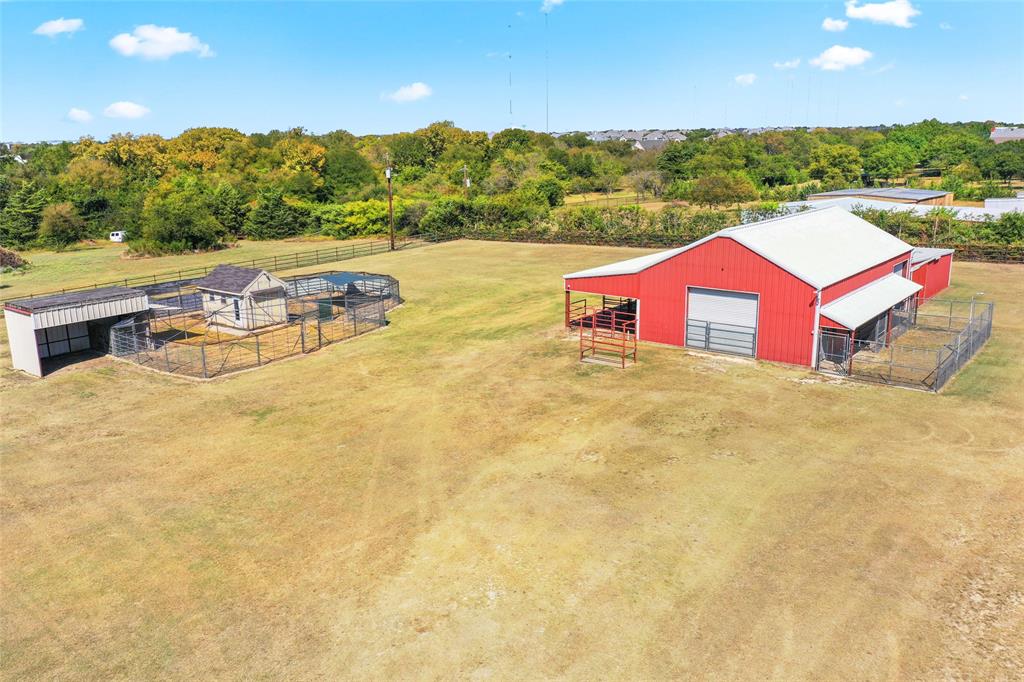 4451 Shiloh Road Midlothian, TX 76065 - Photo 37 of 39 Nice shot of the back pasture with the barn and chcken coop.