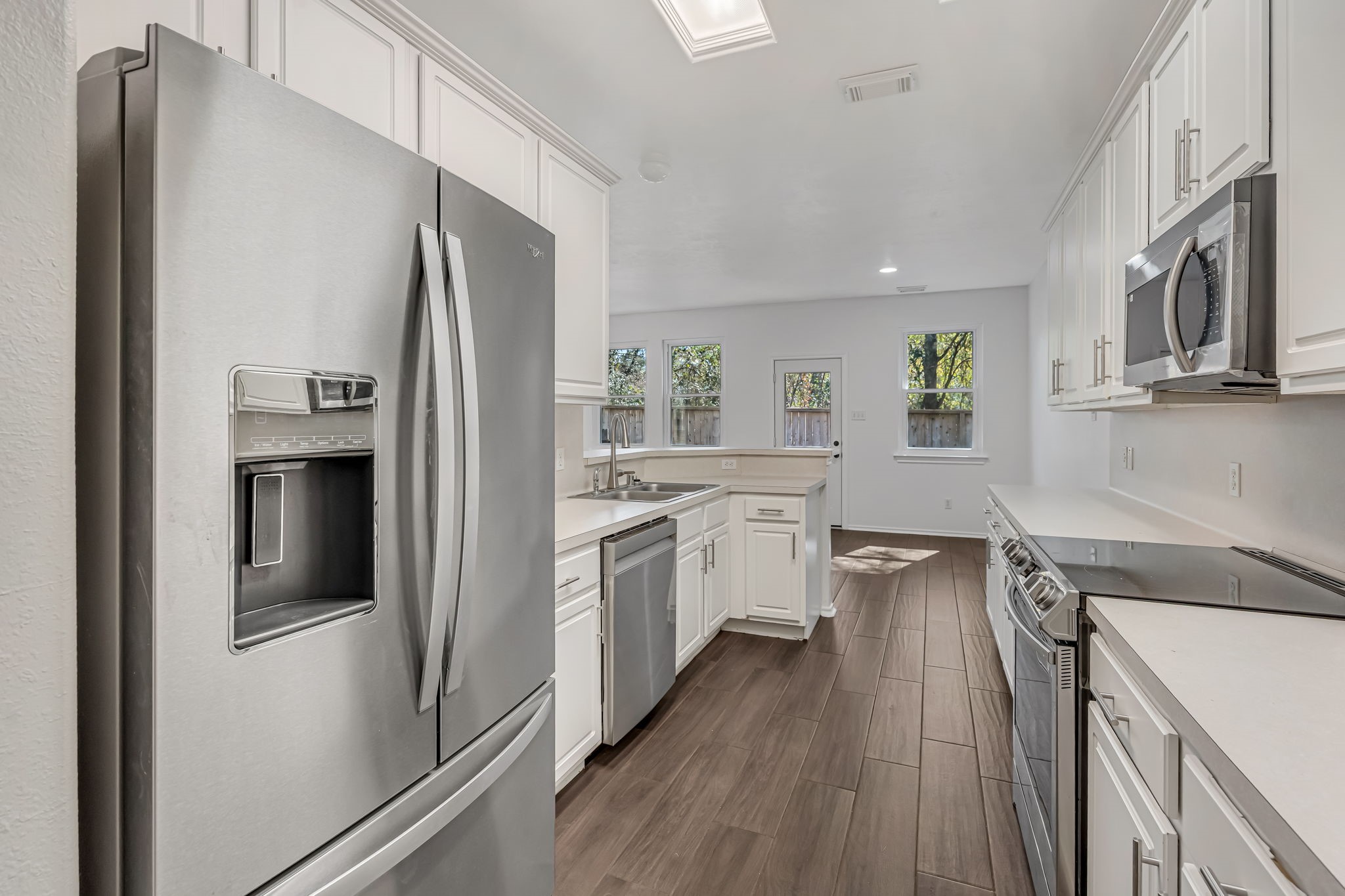 209 Summerhaze Circle Spring, TX 77382 - Photo 2 of 29 Kitchen has SS appliances, recently purchased