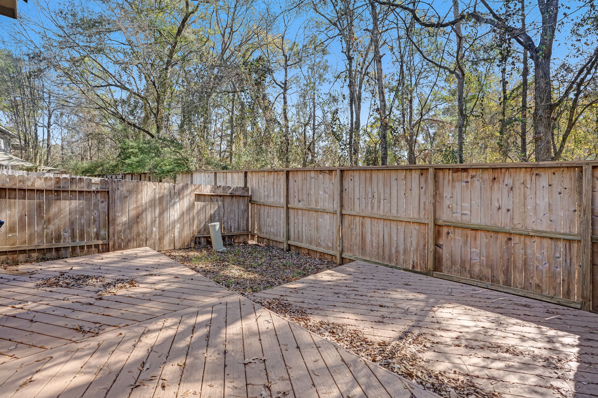 209 Summerhaze Circle Spring, TX 77382 - Photo 25 of 29 Brand new deck, for your entertainment! No grass to worry about.