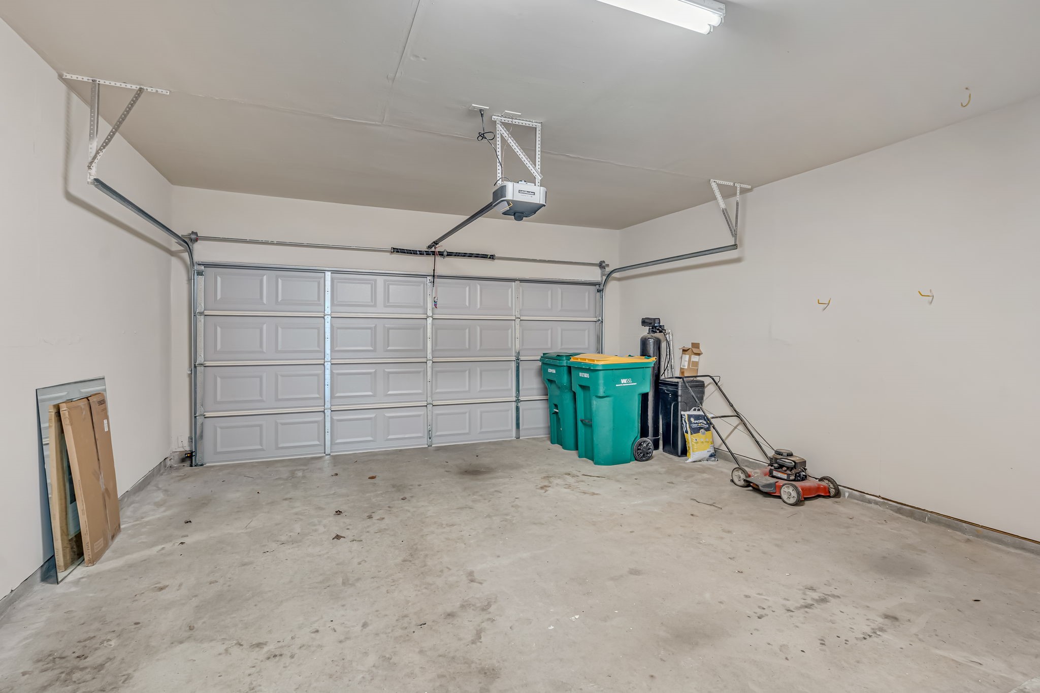 209 Summerhaze Circle Spring, TX 77382 - Photo 29 of 29 Electronic Door Opener and Whole house water filter.