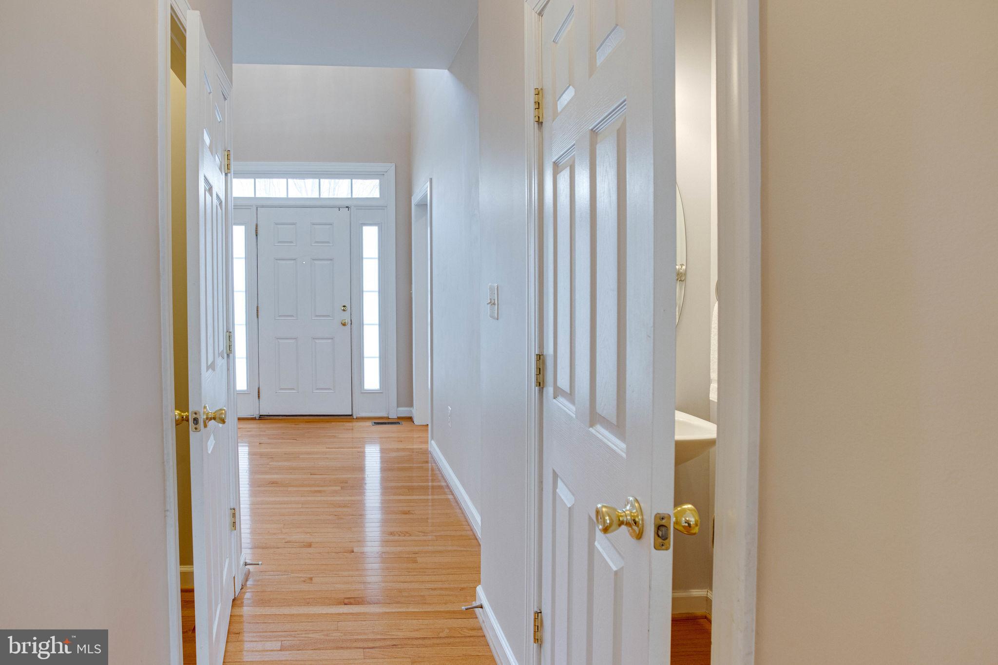 9062 Furey Road Lorton, VA 22079 - Photo 25 of 56 Half bath in hallway to front door