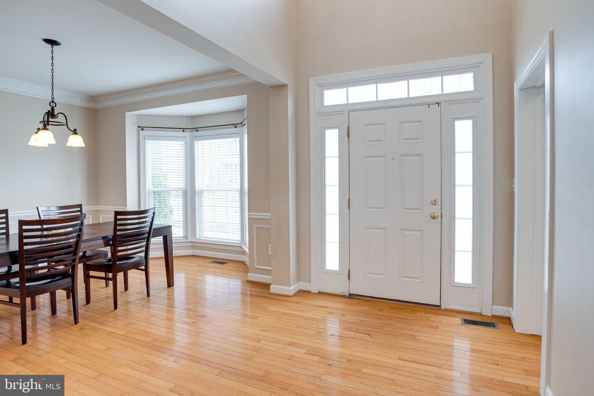 9062 Furey Road Lorton, VA 22079 - Photo 28 of 56 Dining room and front door