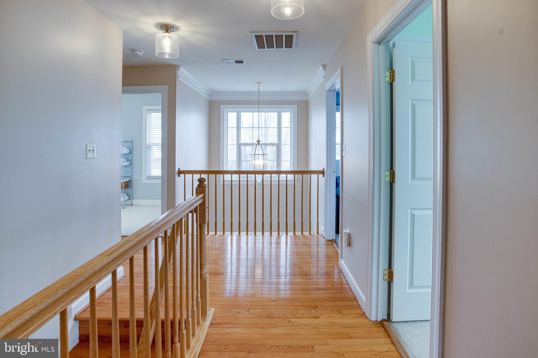 9062 Furey Road Lorton, VA 22079 - Photo 46 of 56 Upstairs hallway looks over front door