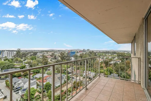 a view of a balcony with city view