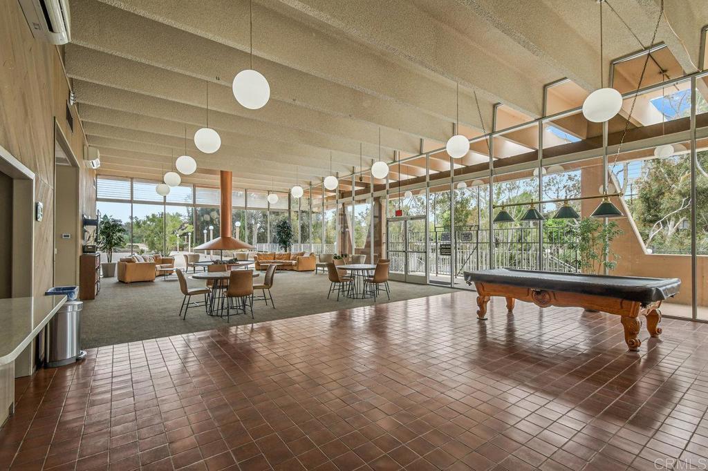 3635 7th Avenue, Unit 13E San Diego, CA 92103 - Photo 25 of 28 a view of a swimming pool and sitting area