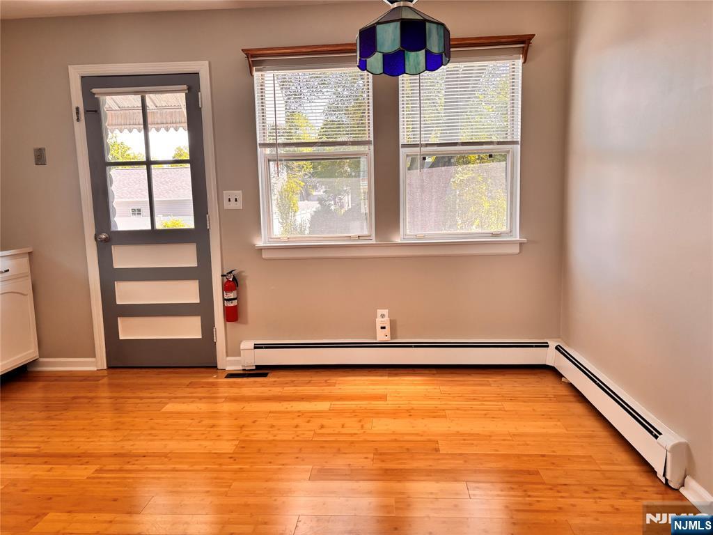 21 Wanamaker Avenue, Unit 1 Waldwick, NJ 07463 - Photo 5 of 13 a view of an empty room with a window