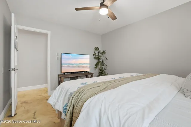 a view of a patio with a table and chairs