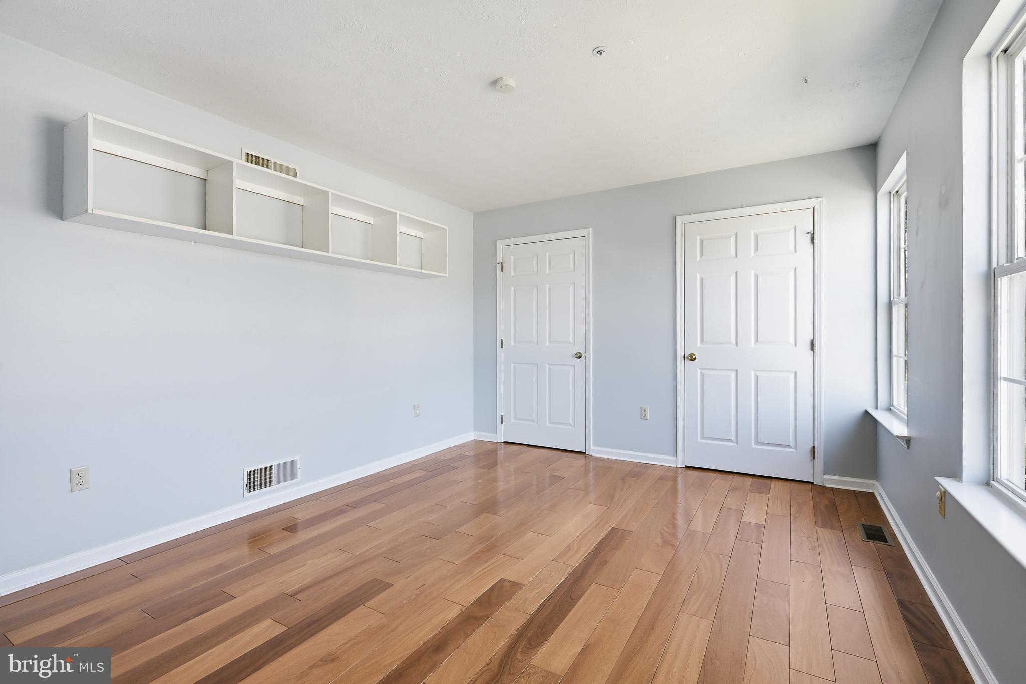 118 Liberty Lane Elkton, MD 21921 - Photo 18 of 31 a view of an empty room with wooden floor and a window