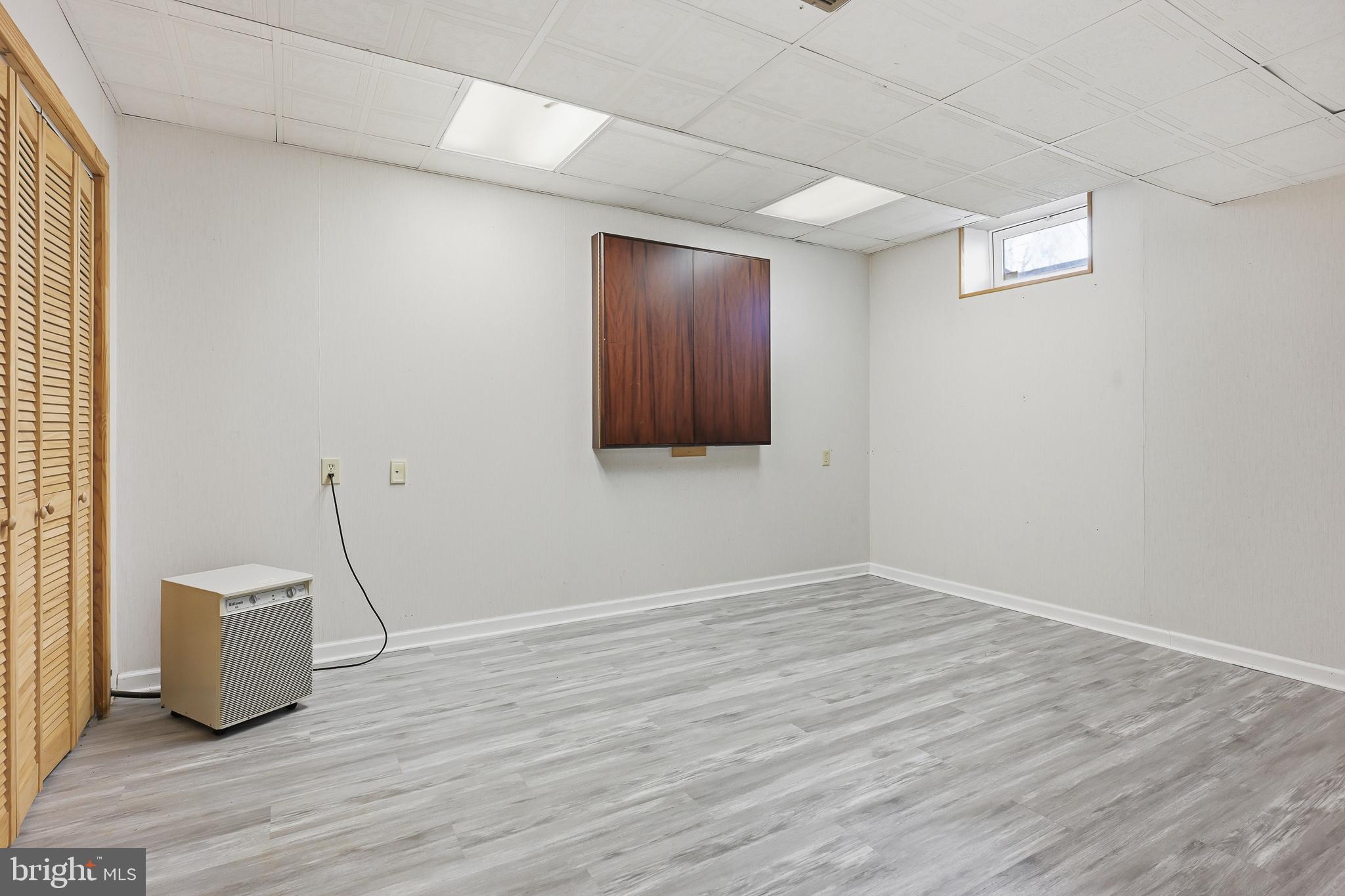118 Liberty Lane Elkton, MD 21921 - Photo 24 of 31 a view of an empty room with wooden floor and a window