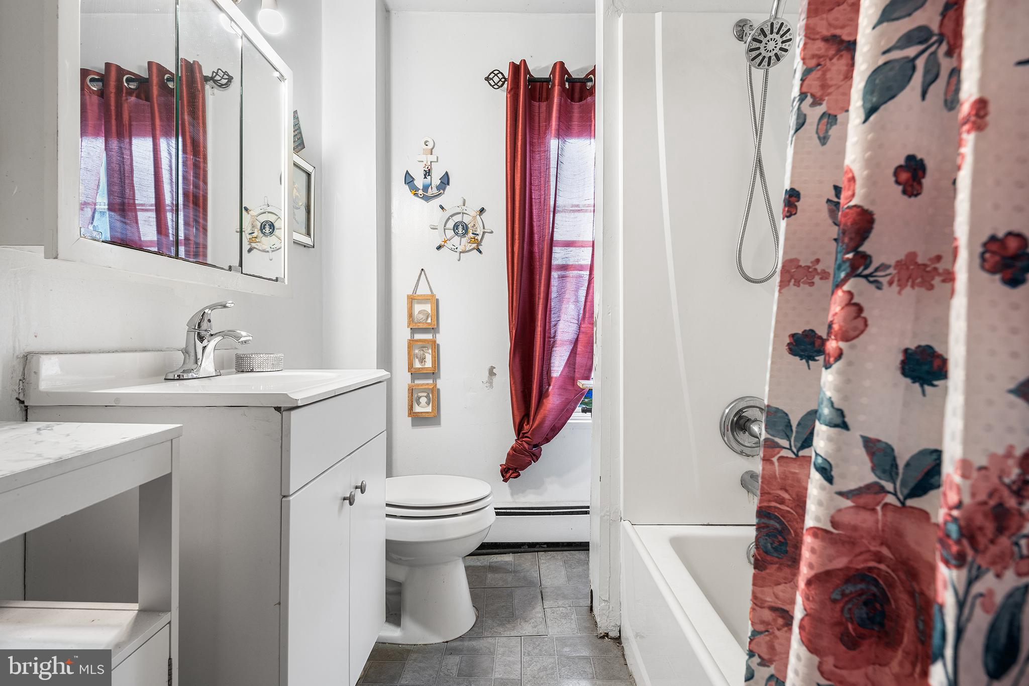 707 East 5th Street Bethlehem, PA 18015 - Photo 16 of 22 a bathroom with a sink toilet and shower