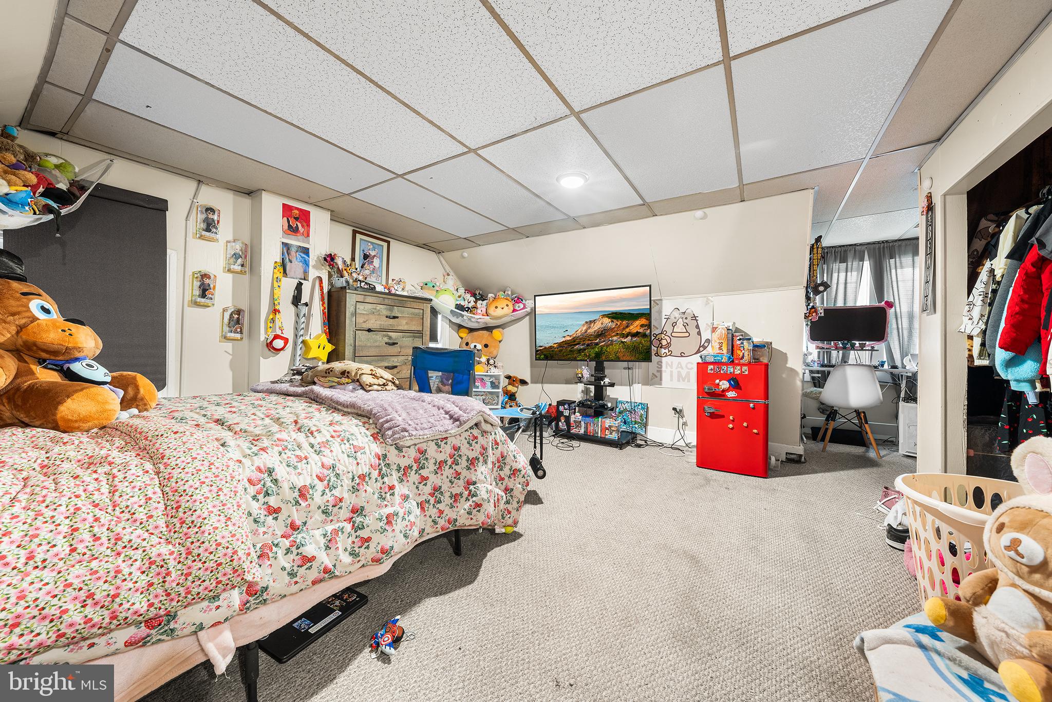 707 East 5th Street Bethlehem, PA 18015 - Photo 18 of 22 a bed room with a bed and a tv