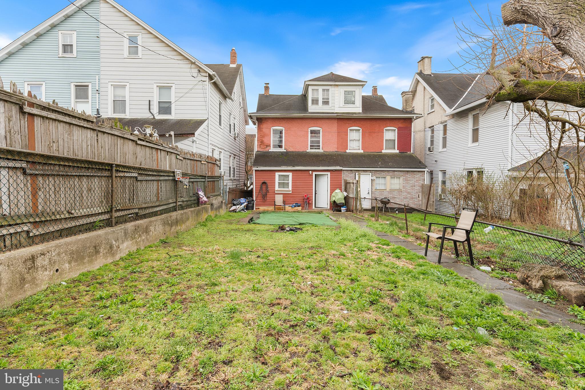 707 East 5th Street Bethlehem, PA 18015 - Photo 21 of 22 a view of a white house with a big yard and large trees
