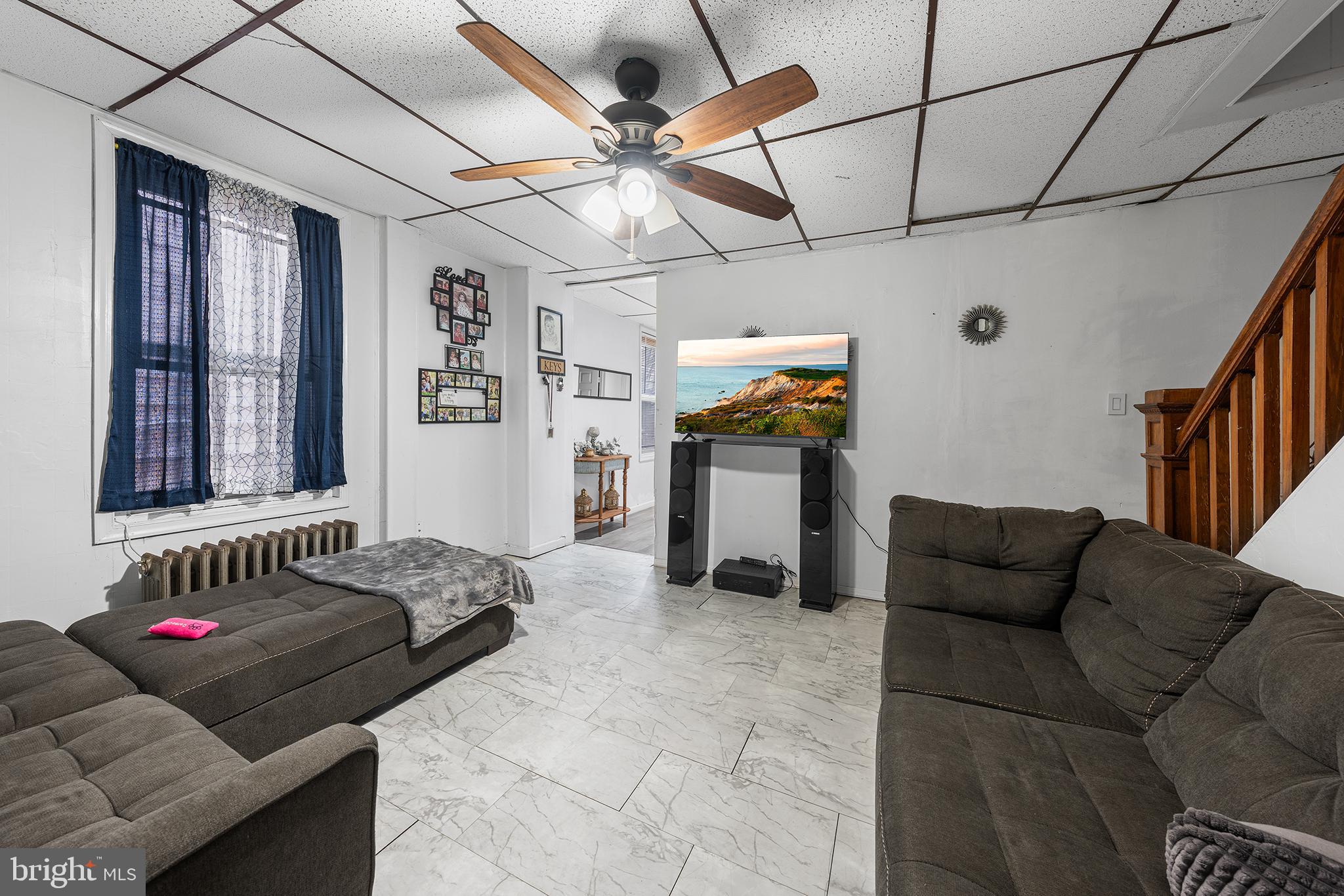 707 East 5th Street Bethlehem, PA 18015 - Photo 5 of 22 a living room with furniture and wooden floor