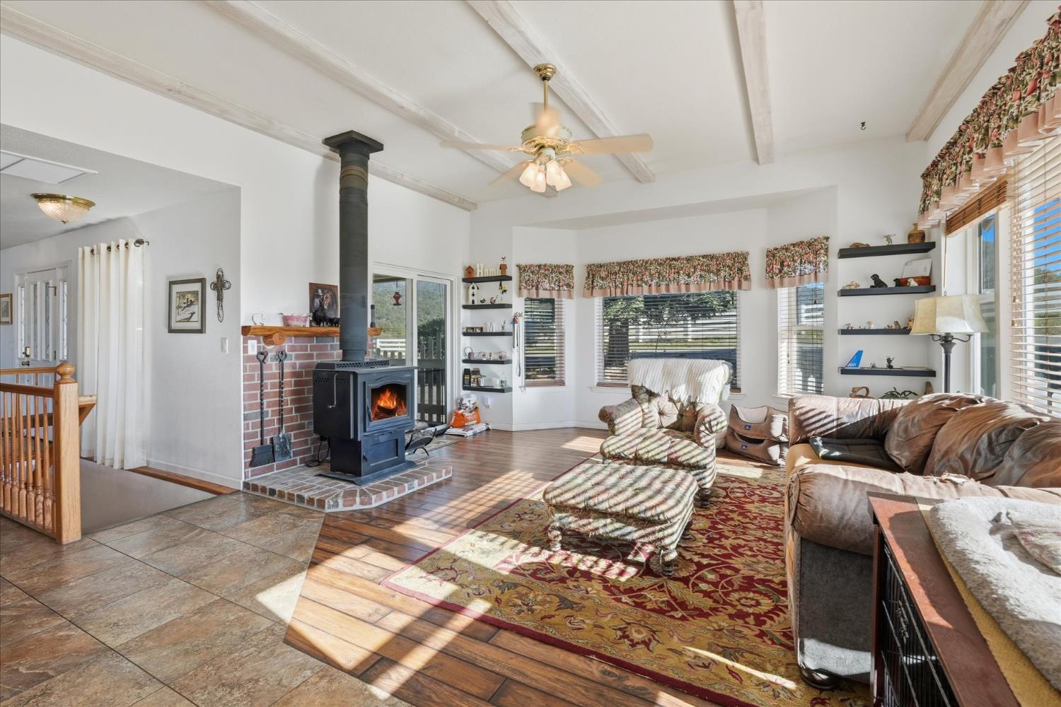 43319 Leach Road Ahwahnee, CA 93601 - Photo 17 of 61 a bedroom with furniture and a large window