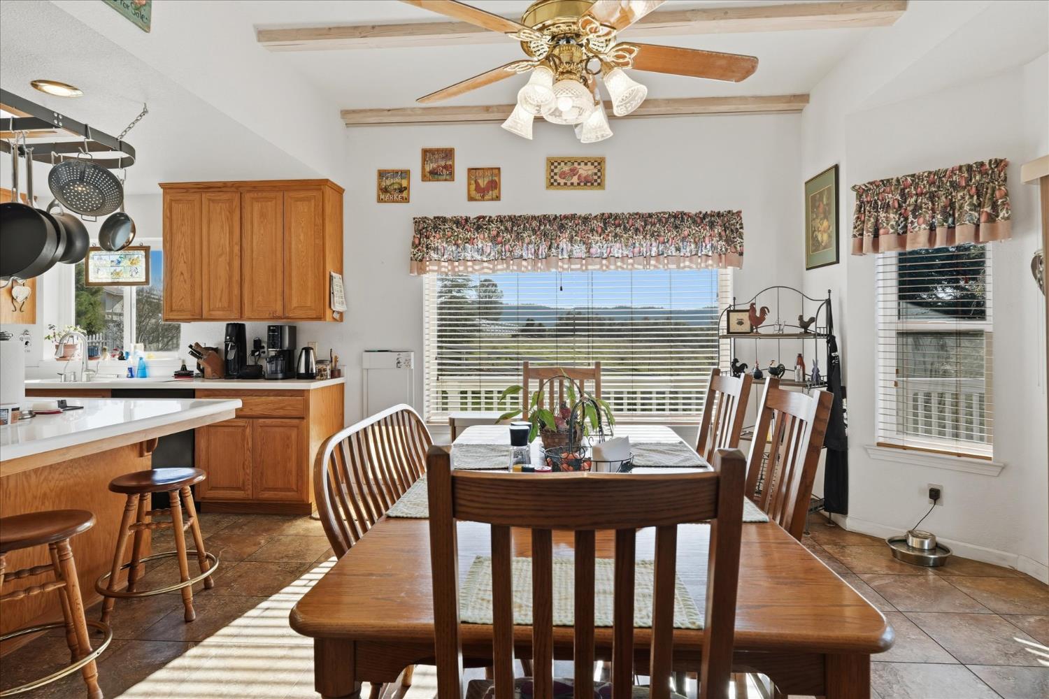 43319 Leach Road Ahwahnee, CA 93601 - Photo 24 of 61 a view of a dining room with furniture window and outside view