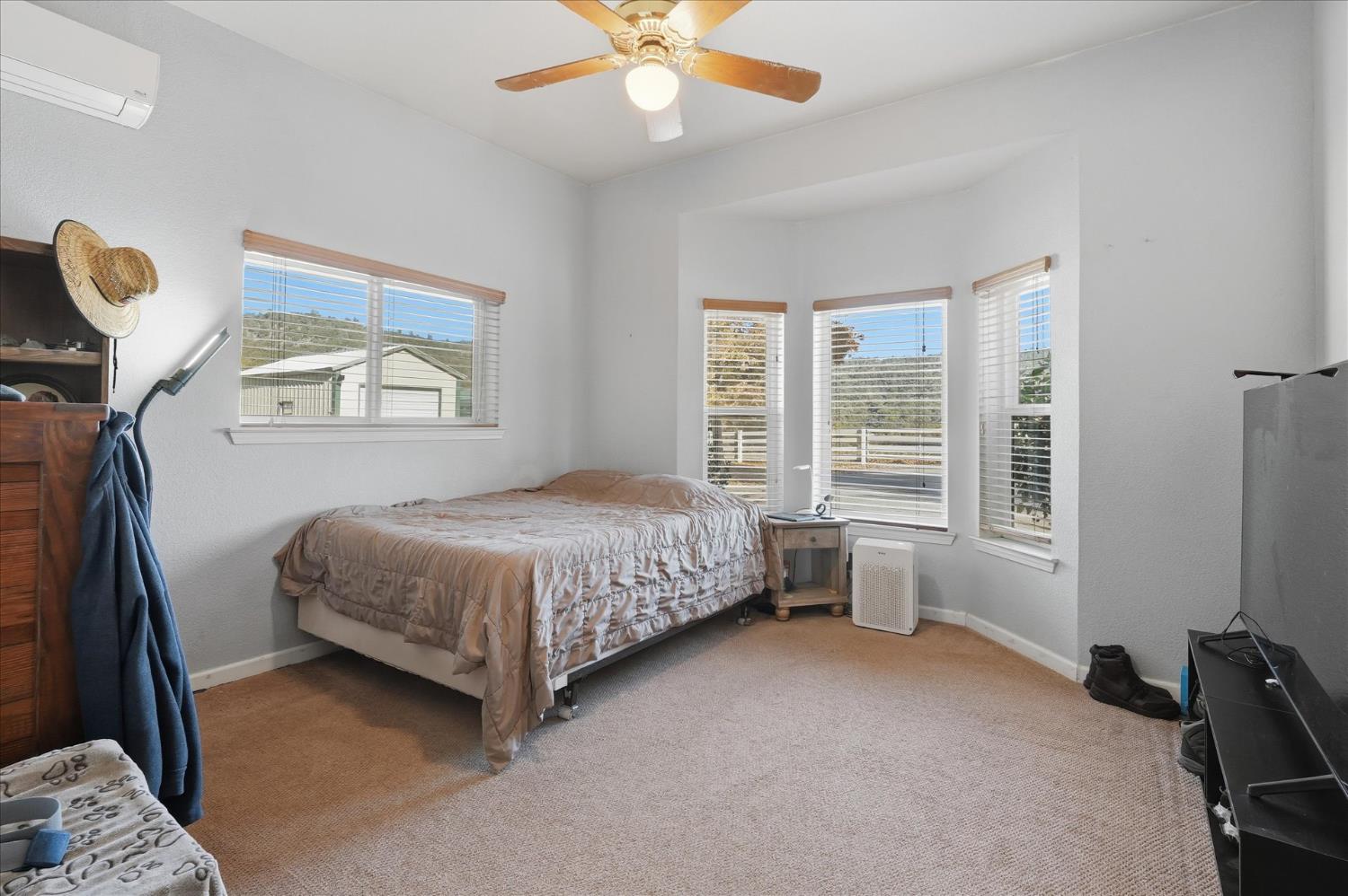 43319 Leach Road Ahwahnee, CA 93601 - Photo 36 of 61 a bedroom with a bed and a window