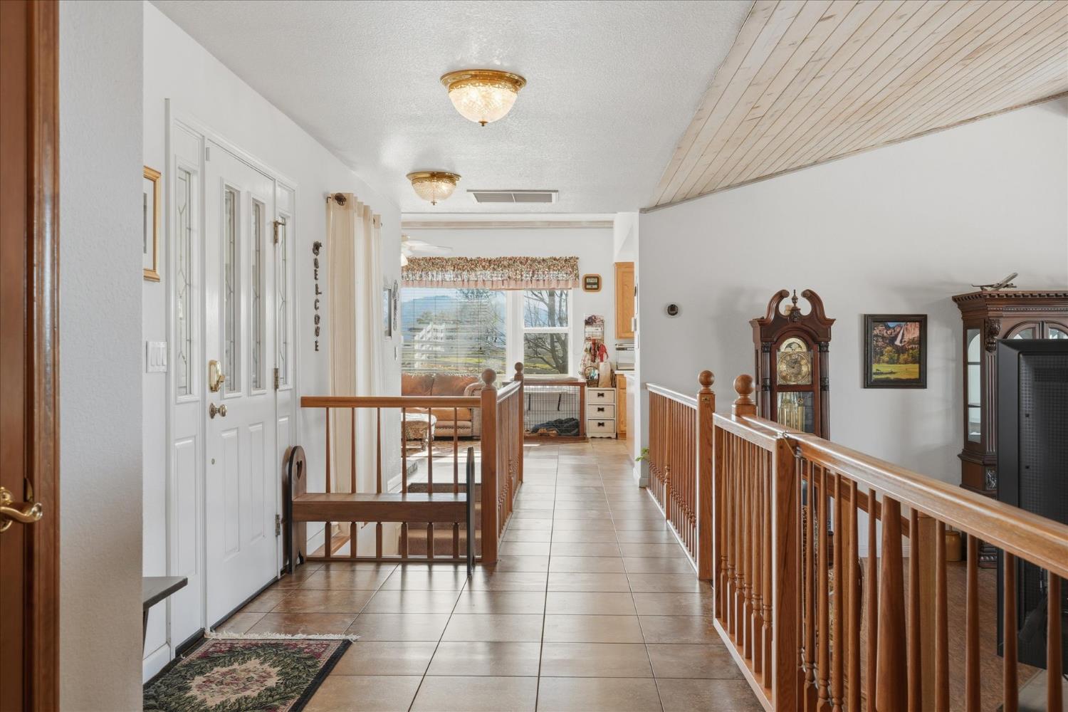 43319 Leach Road Ahwahnee, CA 93601 - Photo 41 of 61 a view of a hallway with dining room and furniture