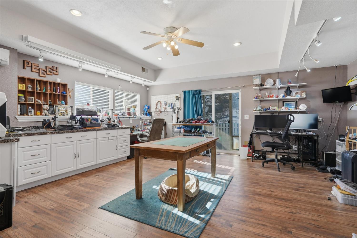 43319 Leach Road Ahwahnee, CA 93601 - Photo 43 of 61 a living room with kitchen island furniture and a kitchen view