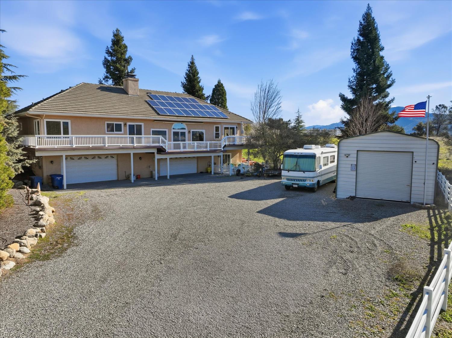 43319 Leach Road Ahwahnee, CA 93601 - Photo 47 of 61 a front view of a house with a yard and garage