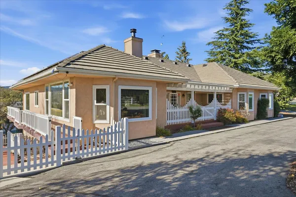 front view of a house with a patio