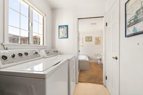 a room with a dryer and washer