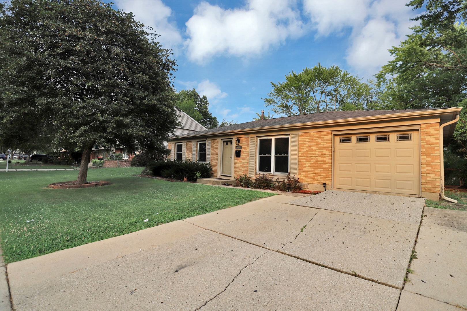 527 Ridge Circle Streamwood, IL 60107 - Photo 1 of 1 front view of a house with a yard