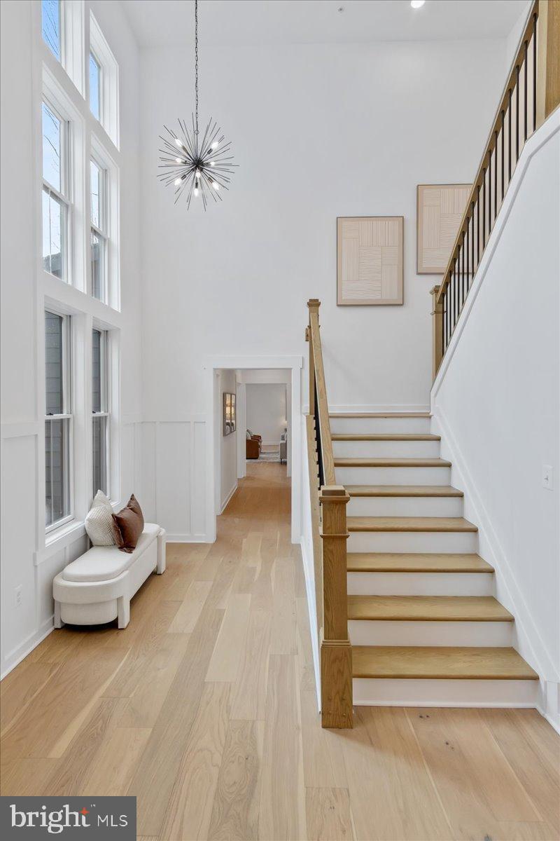 3520 Castle Way Davidsonville, MD 21035 - Photo 12 of 87 Bright and airy entryway with elegant staircase.